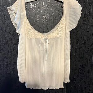Sheer cream ruched deep crew blouse